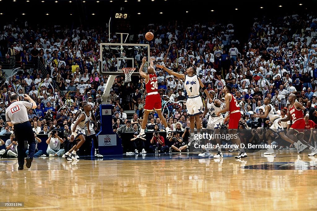 1995 Rockets Final Kenny Smith of the Houston Rockets attempts a shot against Anfernee ...