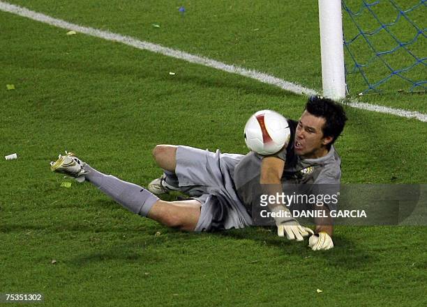 Brazilian goalkeeper Doni stops a penalty kick from Uruguayan defender Diego Lugano during the penalty shootout of their Copa America-Venezuela 2007...