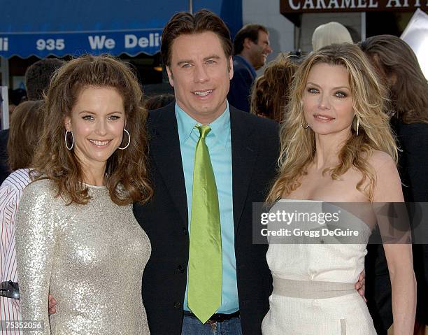 Actress Kelly Preston, actor John Travolta and actress Michelle Pfeiffer arrive at the "Hairspray" premiere at the Mann Village Theatre on July 10,...