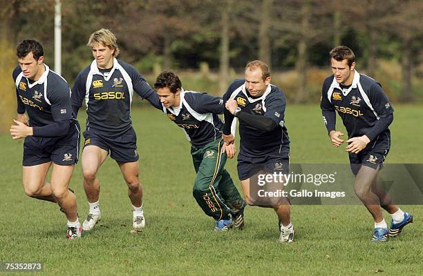 Springboks players run a sprint drill during a South Africa Springboks training session at Belfast Rugby Club on July 11, 2007 in Christchurch, New...