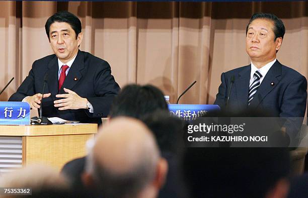 Japanese Prime Minister and ruling Liberal Democratic Party President Shinzo Abe answers questions while main opposition Democratic Party of Japan...