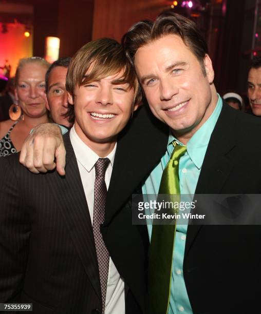 Actors Zac Efron and John Travolta pose at the afterparty for the premiere of New Line's "Hairspray" in Ackerman Hall at UCLA on July 10, 2007 in Los...