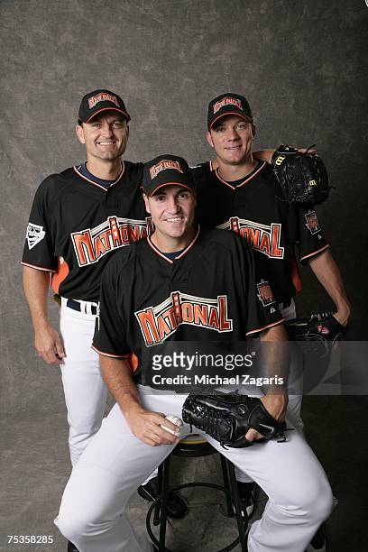 Trevor Hoffman, Chris Young and Jake Peavy, All-Star selections from the San Diego Padres pose for a portrait during the All-Star Workout Day at AT&T...