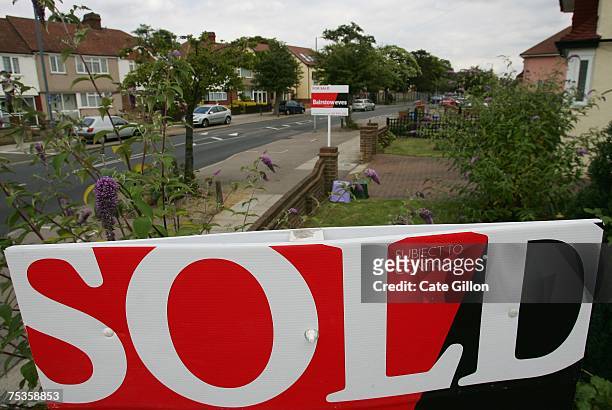 Sold sign stands outside a recently sold property on a street, on July 11 2007, in London, England. PM Gordon Brown has announced that he will make...