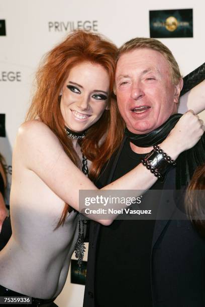 Writer Larry Cohen and Evan of the Suicide Girls arrive for the premiere party for "Captivity" at Privilege Nightclub on July 10, 2007 in West...