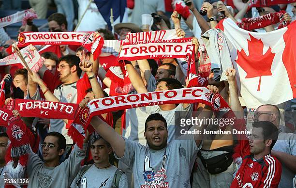 Fans of Toronto FC show their support during the MLS match against the Chicago Fire on July 7, 2007 at Toyota Park in Bridgeview, Illinois. Toronto...