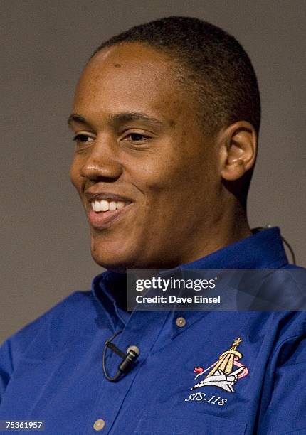 Endeavour mission specialist Alvin Drew smiles as he comments during a crew briefing July 11, 2007 at Johnson Space Center in Houston. The shuttle...