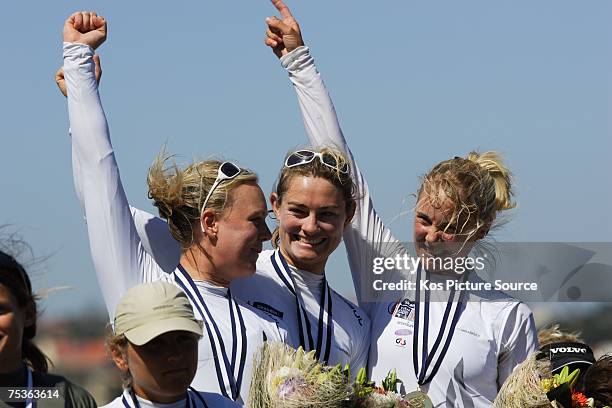 British Olympic Gold medalists Sarah Ayton and Sarah Webb along with new crew member Pippa Wilson , celebrate winning Gold Medals in the Yngling...