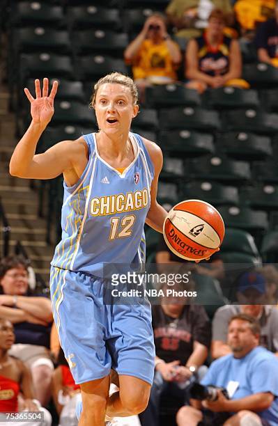 Stacey Dales of the Chicago Sky calls a play as she moves the ball up court during the WNBA game against the Indiana Fever on July 8, 2007 at Conseco...