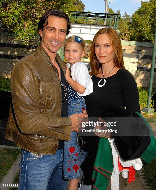 Actor Daniel Bernhardt, daughter Bella Bernhardt and his wife Lisa Stothard-Bernhardt attend the Los Angeles Philharmonic and Venice Magazine Annual...