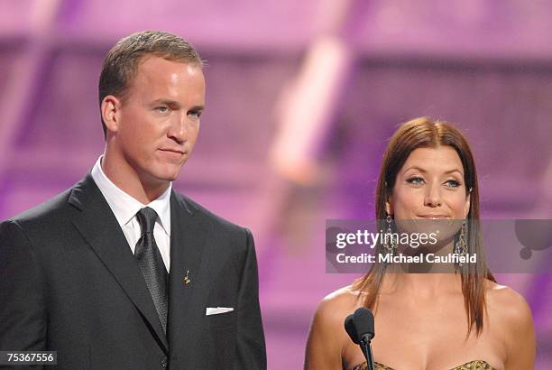 Presenters Peyton Manning and Kate Walsh speak on stage during the 2007 ESPY Awards at the Kodak Theatre on July 11, 2007 in Hollywood, California.