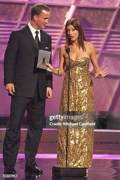 Presenters Peyton Manning and Kate Walsh speak on stage during the 2007 ESPY Awards at the Kodak Theatre on July 11, 2007 in Hollywood, California.