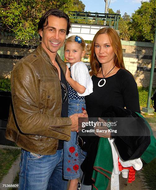 Actor Daniel Bernhardt, daughter Bella Bernhardt and his wife Lisa Stothard-Bernhardt attend the Los Angeles Philharmonic and Venice Magazine Annual...