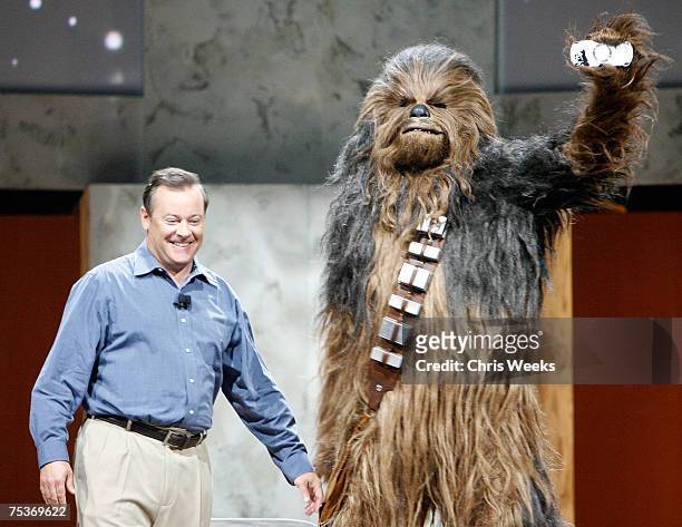 Star Wars character Chewbacca presents the new Star Wars PlayStation Portable Player to Sony Computer Entertainment C.E.O. Jack Tretton at the Sony...