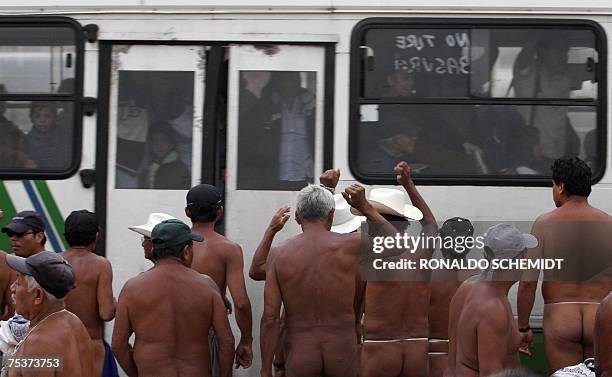 Peasants, members of the "400 Pueblos" mouvement protest in Mexico City 11 July 2007, against the dispossession of lands in the Veracruz State,...