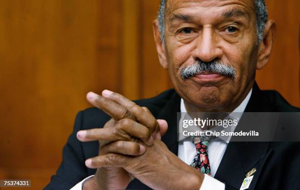 House Judiciary Committee Chairman John Conyers waits for former White House councel Harriet Miers to arrive and testify before the Commercial and...