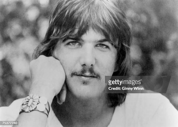 Singer/songwriter Gram Parsons poses for a portrait in circa 1973.