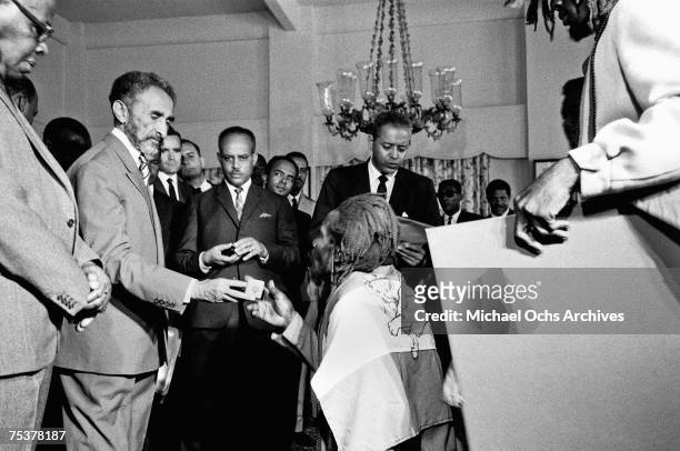 Haile Selassie I , , Emperor of Ethiopia, greets a delegation of Rastafaian leaders at a reception on April 21, 1966 in Kingston, Jamaica.