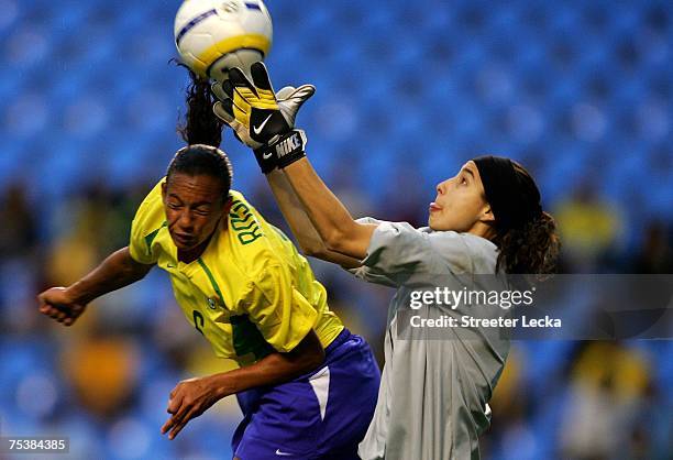 Luciana Gomez of Uruguay collides with Rosana Augusto of Brazil during the women's football first round group A game between Uruguay and Brazil at...