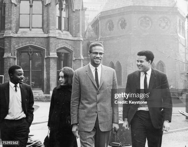 Black Nationalist leader and Nation of Islam spokesman Malcolm X in Oxford with Eric Abrahams, right, the Student Union president, before addressing...