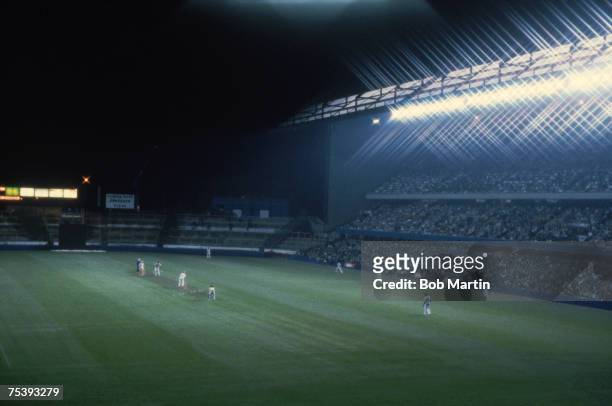 Britain's first floodlit cricket match takes place between Essex and the West Indies at Chelsea F.C.'s Stamford Bridge ground, London, August 1980.