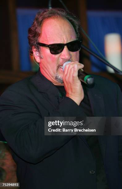 Jim Belushi & The Sacred Hearts perform at the Chicago opening of Martini Park on July 12, 2007 in Chicago.