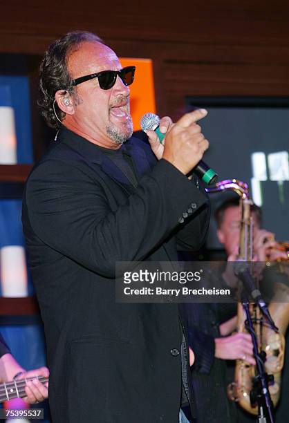Jim Belushi & The Sacred Hearts perform at the Chicago opening of Martini Park on July 12, 2007 in Chicago.