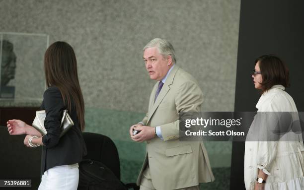 Former Hollinger International CEO Conrad Black arrives at court with his daughter Alana and wife Barbara Ameil Black July 13, 2007 in Chicago,...