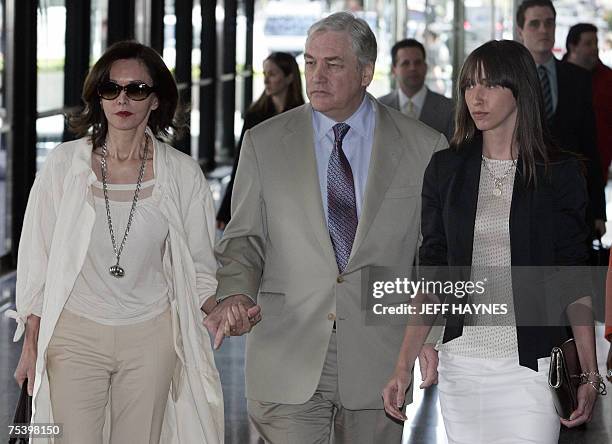 Chicago, UNITED STATES: Deposed media tycoon Conrad Black leaves the Everett McKinley Dirksen Federal Courthouse, in Chicago, Illinois with his wife...