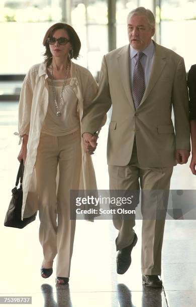 Former Hollinger International CEO Conrad Black leaves court with his wife Barbara Amiel July 13, 2007 in Chicago, Illinois. Black was found guilty...