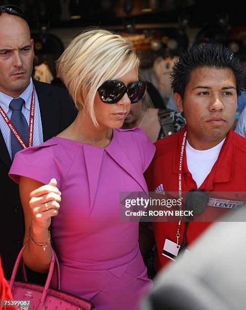 Carson, UNITED STATES: Victoria Beckham finishes her shopping and leaves the soccer store at the Home Depot Center in Carson, California, 13 July...