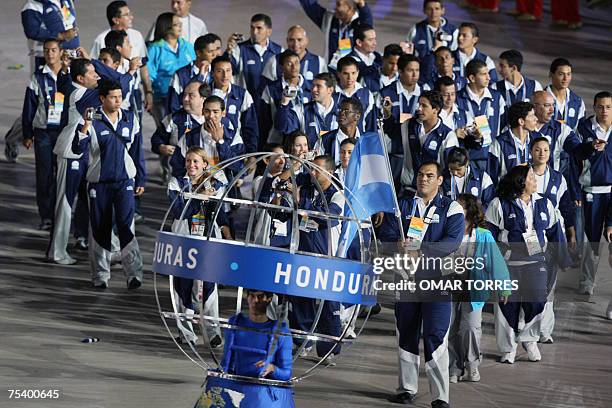 Rio de Janeiro, BRAZIL: The delegation of Honduras, led by judoist Luis Moran, enters the Maracana Stadium in Rio de Janerio, Brazil, on July 13th...