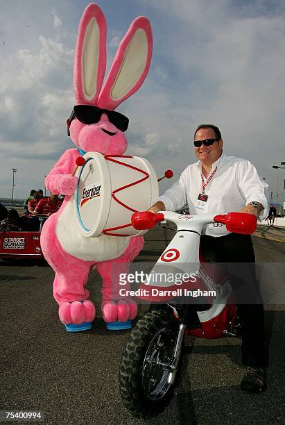 Chip Ganassi, team owner of Target Chip Ganassi Racing poses with the Energizer Bunny during practice for the IRL IndyCar Series Firestone Indy 200...