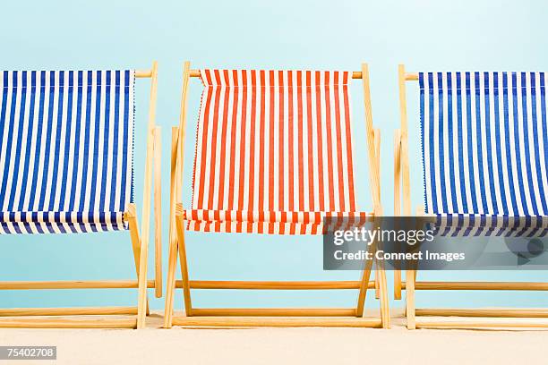 three deckchairs - sedia da giardino foto e immagini stock