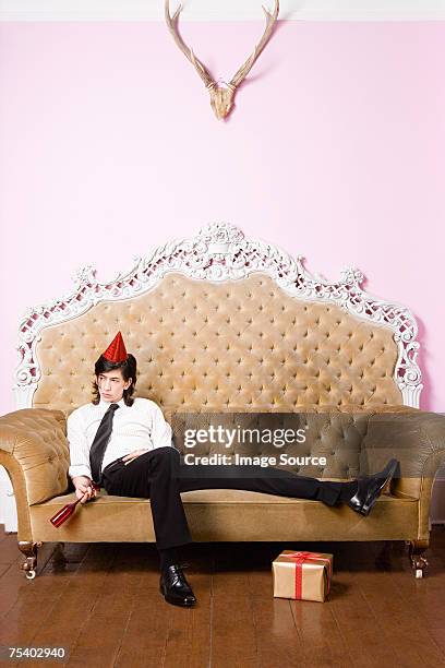 young man at party - sad birthday stock pictures, royalty-free photos & images