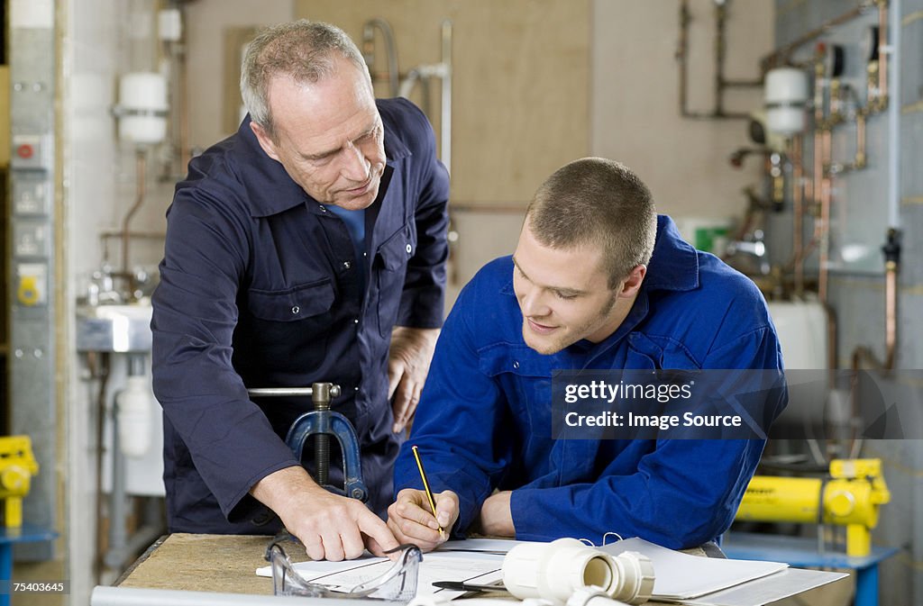 Plumber and apprentice