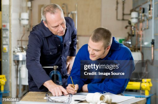 Plumber and apprentice Plumber and apprentice