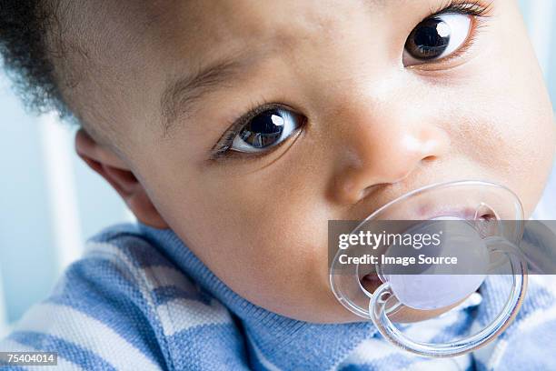 portrait of baby boy - pacifier stock pictures, royalty-free photos & images