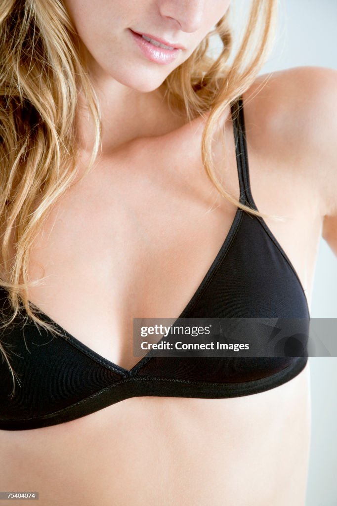 Woman wearing a black bra