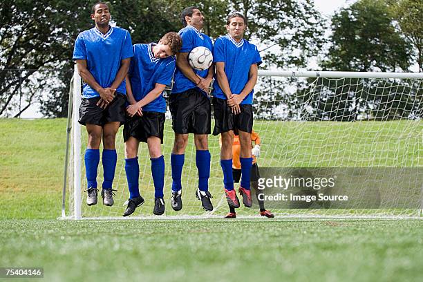 footballers jumping - male crotch stock pictures, royalty-free photos & images
