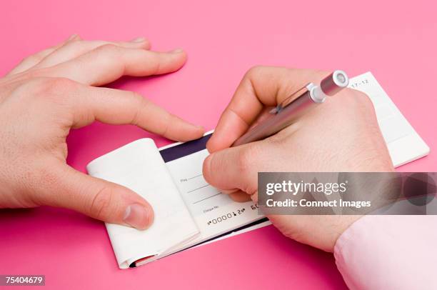 Signing Cheque 166 Person Signing A Cheque Stock Photos, High-Res Pictures, and Images ...