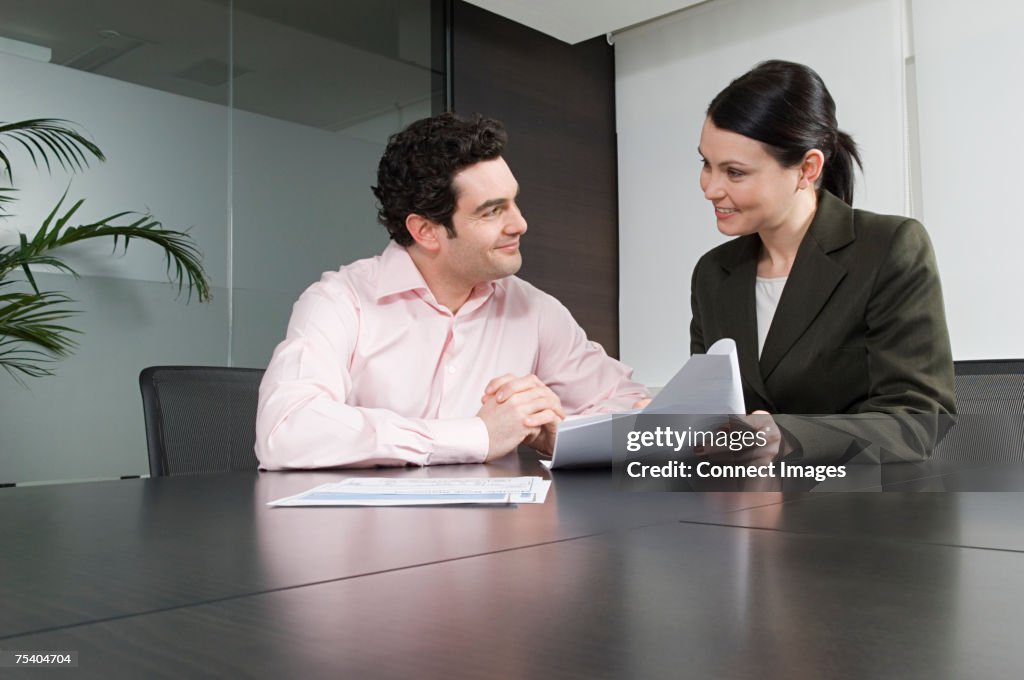 Bank manager helping customer
