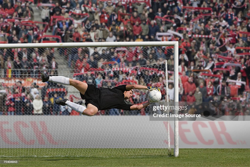 Goalkeeper making a save