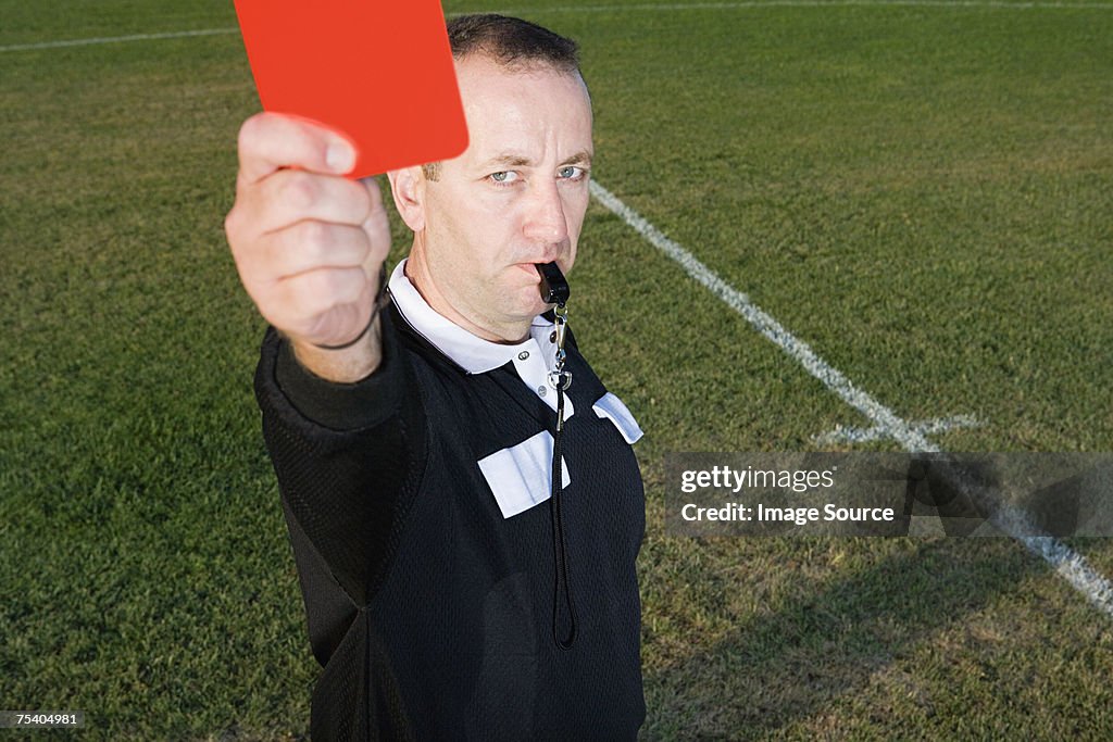 Referee Holding Red Card High-Res Stock Photo - Getty Images
