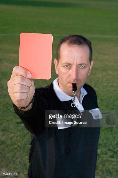 referre holding red card - red card stock pictures, royalty-free photos & images