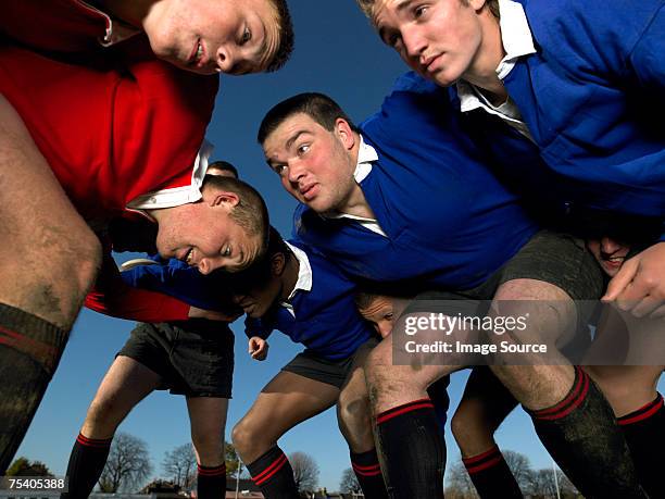 rugby players in a scrum - rugby match stock pictures, royalty-free photos & images