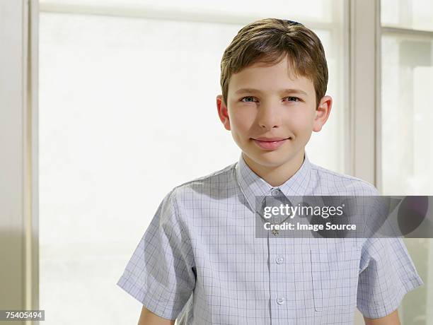 jewish boy wearing a star of david necklace - yarmulke stock pictures, royalty-free photos & images