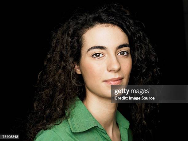 portrait of a young woman - black background portrait stockfoto's en -beelden