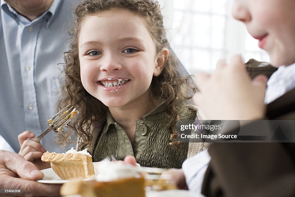 Girl eating pie