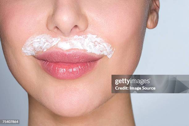 woman bleaching facial hair - electrolysis stock pictures, royalty-free photos & images